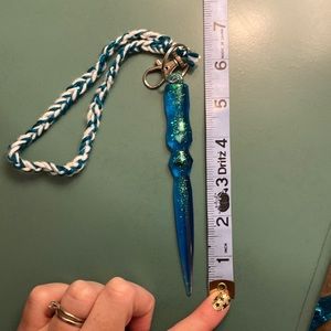 Blue/purple resin self defense keychain with stones